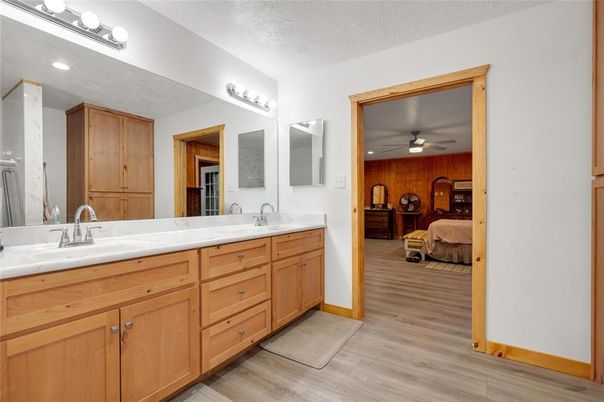 Bathroom, Bedroom, Dual Sink Vanities, Interior, Recessed Lighting, Wood Texture Flooring