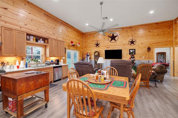 Dining room, Interior, Kitchen, Living room, Recessed Lighting, Wood Texture Flooring, Wooden Walls