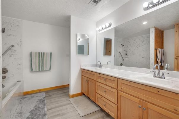 Bathroom, Dual Sink Vanities, Interior, Marble Walls, Wood Texture Flooring