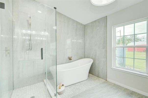 Bathroom, Free Standing Baths, Glass Shower, Interior, Marble Walls, Recessed Lighting