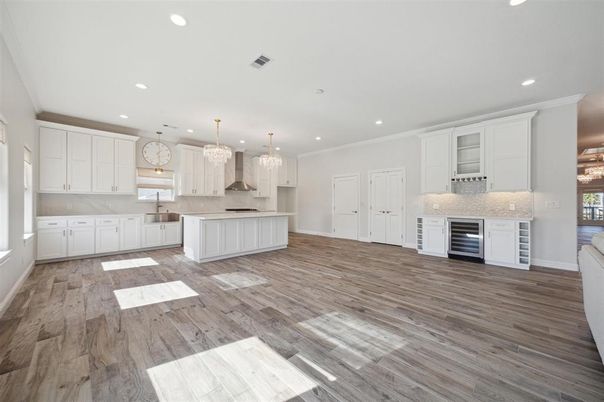 Chandelier, Interior, Kitchen, Pendant Lights, Recessed Lighting, Stainless Steel Appliances, Wood Texture Flooring
