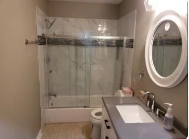 Bathroom, Glass Shower, Interior, Marble Walls, Wood Texture Flooring