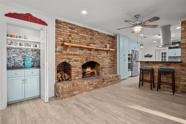 Fireplace, Interior, Kitchen, Pendant Lights, Recessed Lighting, Stone Walls, Wood Texture Flooring