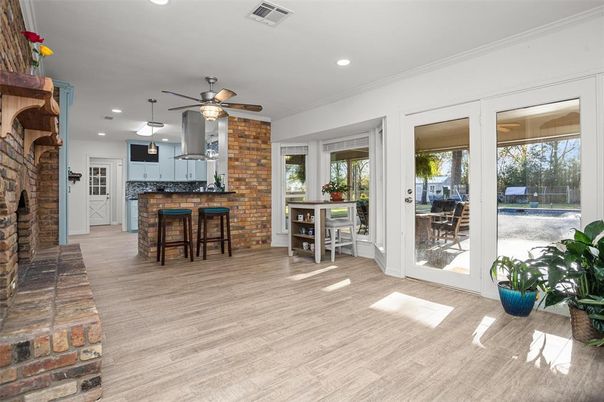 Dining room, Fireplace, Interior, Kitchen, Pendant Lights, Recessed Lighting, Stone Walls, Wood Texture Flooring