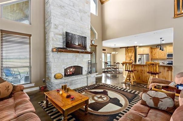 Dining room, Fireplace, Interior, Kitchen, Living room, Pendant Lights, Recessed Lighting, Stainless Steel Appliances, Stone Walls