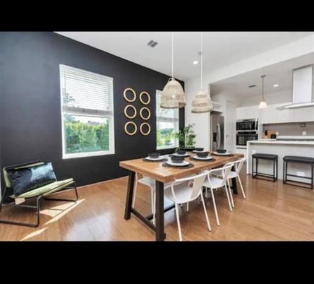 Dining room, Interior, Kitchen, Pendant Lights, Recessed Lighting, Stainless Steel Appliances, Wood Texture Flooring