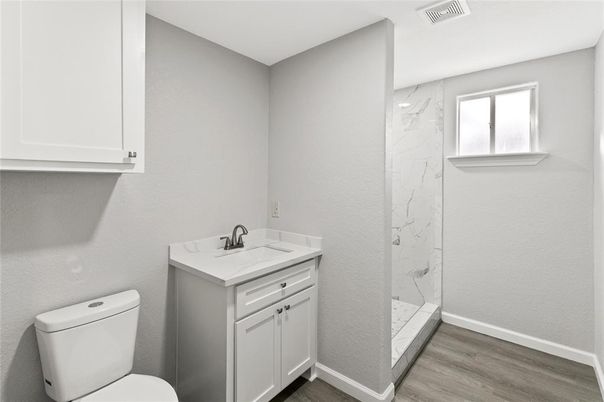 Bathroom, Glass Shower, Interior, Marble Walls, Wood Texture Flooring