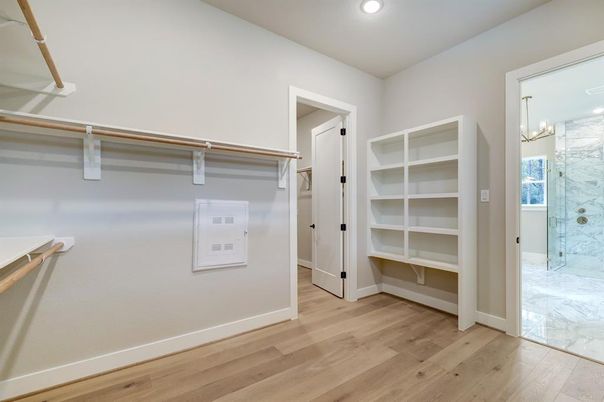 Bathroom, Glass Shower, Interior, Recessed Lighting, Walk-in Closets, Wood Texture Flooring