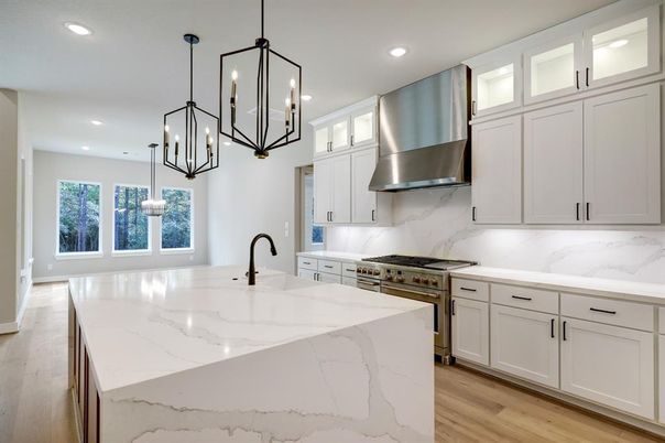 Interior, Kitchen, Marble Walls, Pendant Lights, Recessed Lighting, Stainless Steel Appliances, Wood Texture Flooring