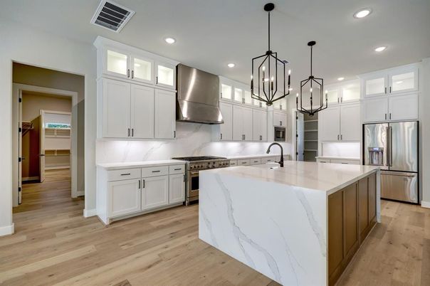 Interior, Kitchen, Marble Walls, Pendant Lights, Recessed Lighting, Stainless Steel Appliances, Wood Texture Flooring