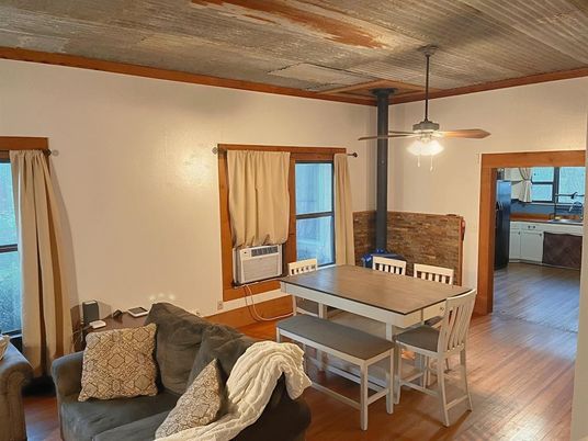 Dining room, Fireplace, Interior, Water, Wood Texture Flooring