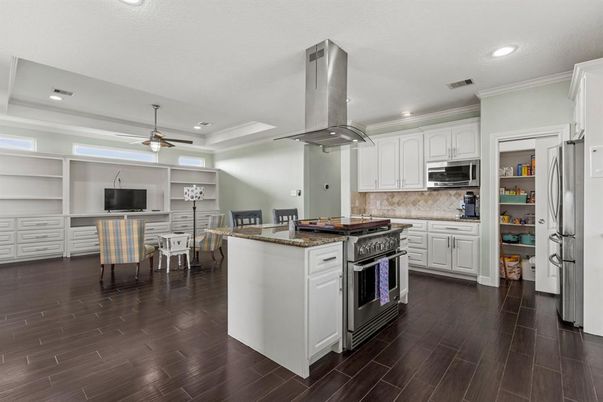 Dining room, Interior, Kitchen, Recessed Lighting, Stainless Steel Appliances, Wood Texture Flooring