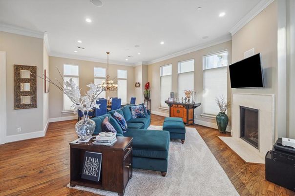 Dining room, Fireplace, Interior, Living room, Recessed Lighting, Wood Texture Flooring