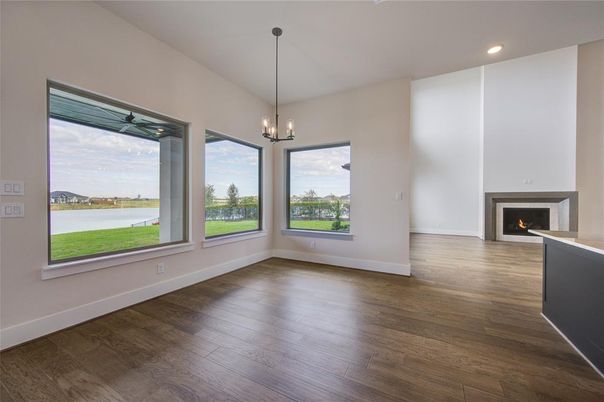 Empty room, Fireplace, Interior, Pendant Lights, Recessed Lighting, Wood Texture Flooring
