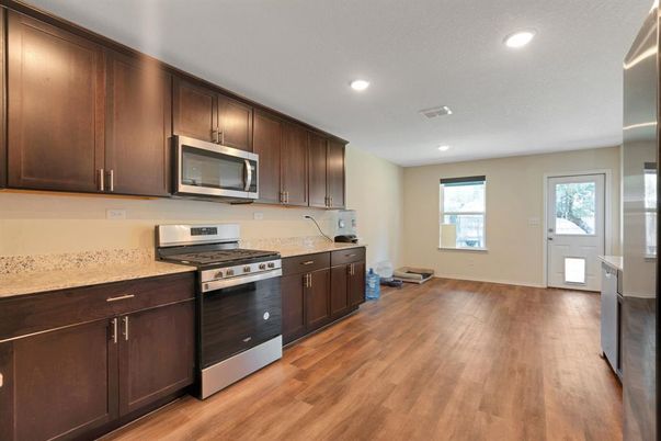 Interior, Kitchen, Recessed Lighting, Stainless Steel Appliances, Wood Texture Flooring
