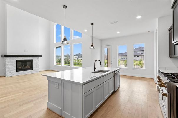 Fireplace, Interior, Kitchen, Pendant Lights, Recessed Lighting, Stainless Steel Appliances, Wood Texture Flooring