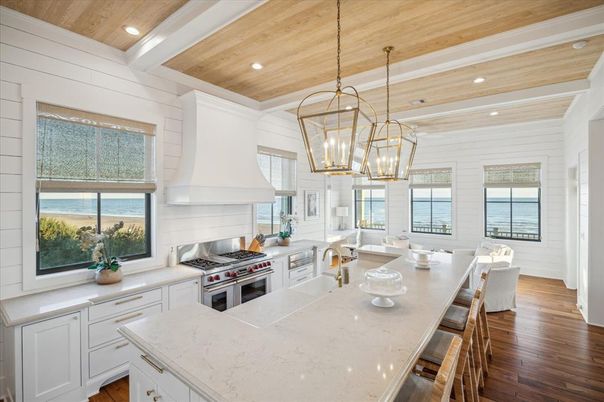 Dining room, Interior, Kitchen, Pendant Lights, Recessed Lighting, Stainless Steel Appliances, Water, Wooden Ceilings, Wood Texture Flooring