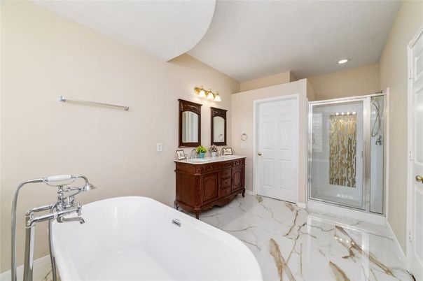 Bathroom, Dual Sink Vanities, Free Standing Baths, Glass Shower, Interior, Marble, Recessed Lighting