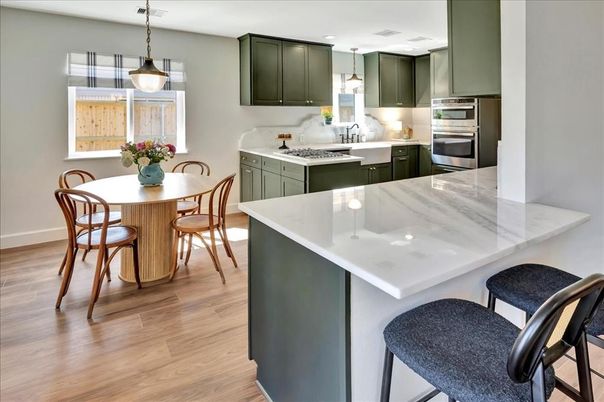 Dining room, Interior, Kitchen, Pendant Lights, Recessed Lighting, Stainless Steel Appliances, Wood Texture Flooring