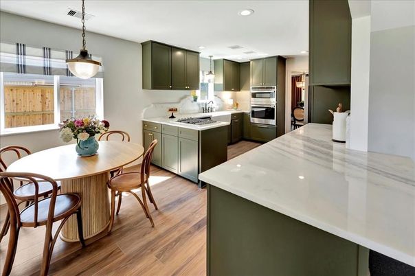 Dining room, Interior, Kitchen, Pendant Lights, Recessed Lighting, Stainless Steel Appliances, Wood Texture Flooring