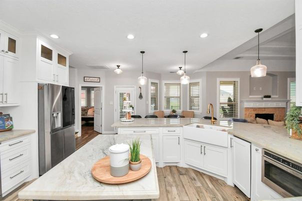 Dining room, Interior, Kitchen, Pendant Lights, Recessed Lighting, Stainless Steel Appliances, Wood Texture Flooring