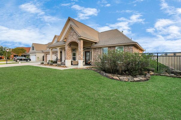 Attached, Backyard, Exterior, Facade, Brick Facade, Tudor Revival
