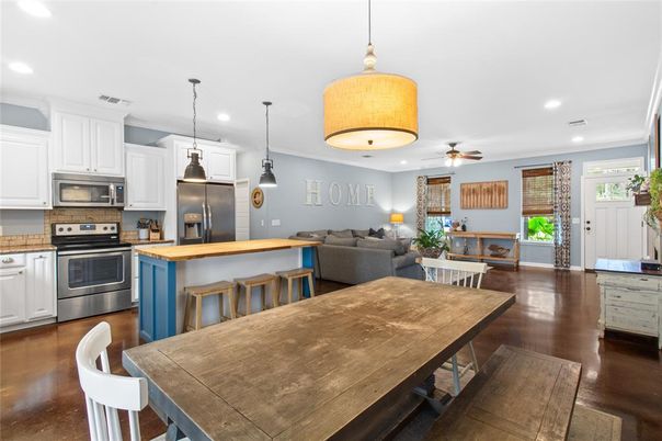 Dining room, Interior, Kitchen, Living room, Pendant Lights, Recessed Lighting, Stainless Steel Appliances, Wood Texture Flooring