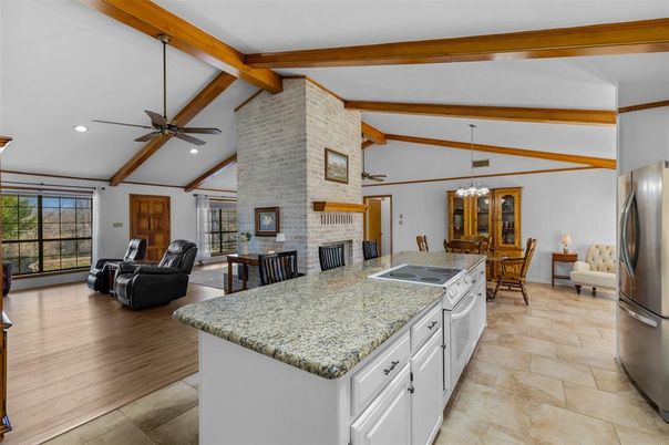 Dining room, Fireplace, Interior, Kitchen, Living room, Recessed Lighting, Stone Walls, Wooden Beams, Wood Texture Flooring