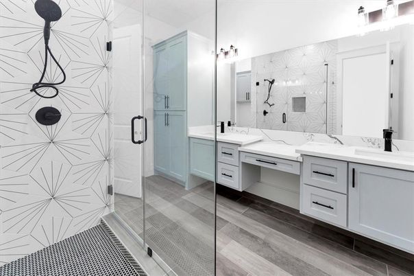 Bathroom, Dual Sink Vanities, Glass Shower, Interior, Marble Walls, Wood Texture Flooring