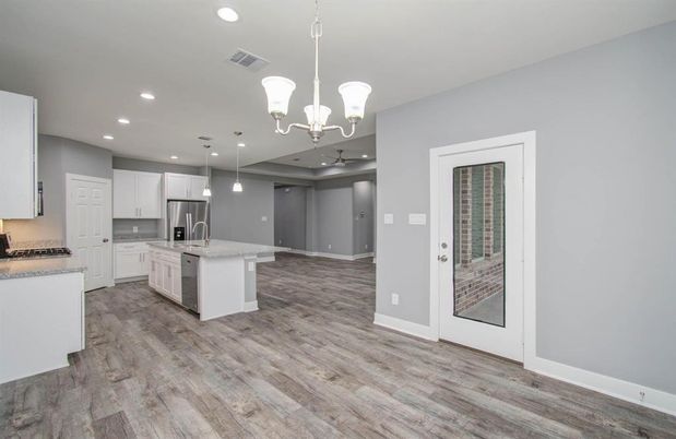 Chandelier, Interior, Kitchen, Pendant Lights, Recessed Lighting, Stainless Steel Appliances, Wood Texture Flooring