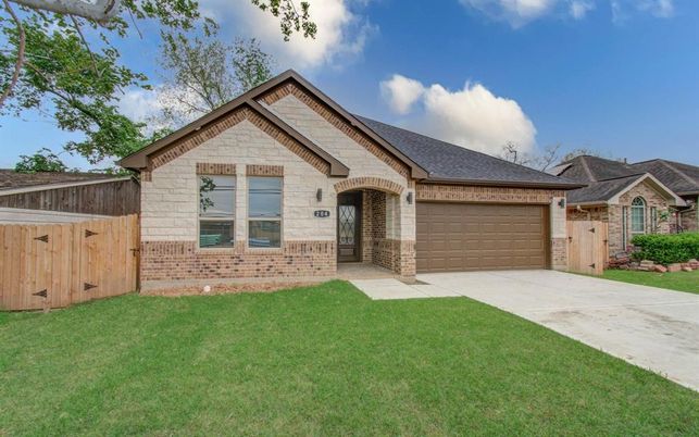 Attached, Backyard, Exterior, Facade, Brick Facade, Brick Traditional