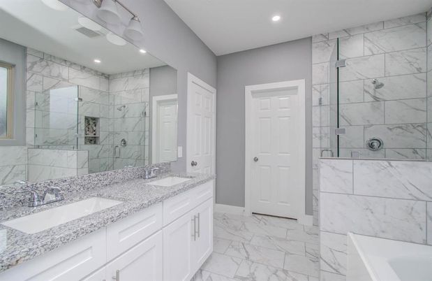 Bathroom, Dual Sink Vanities, Glass Shower, Interior, Marble, Marble Walls, Recessed Lighting