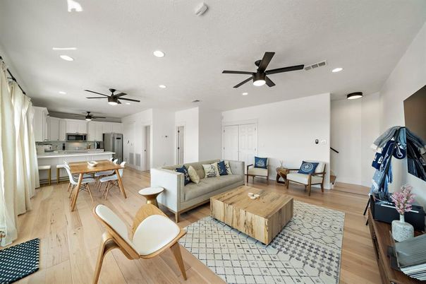 Dining room, Interior, Kitchen, Living room, Recessed Lighting, Stainless Steel Appliances, Wood Texture Flooring