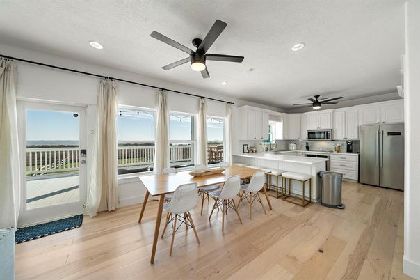 Dining room, Interior, Kitchen, Recessed Lighting, Stainless Steel Appliances, Wood Texture Flooring