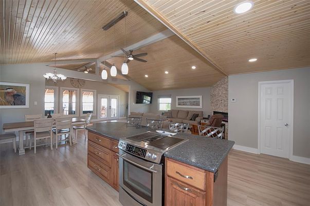 Chandelier, Dining room, Interior, Kitchen, Living room, Recessed Lighting, Wooden Ceilings, Wood Texture Flooring