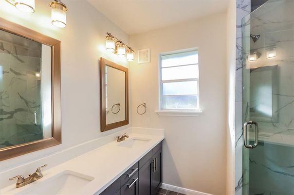 Bathroom, Dual Sink Vanities, Glass Shower, Interior, Marble Walls