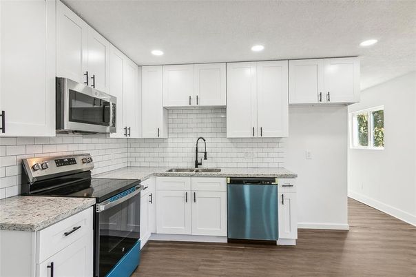 Interior, Kitchen, Recessed Lighting, Stainless Steel Appliances, Wood Texture Flooring
