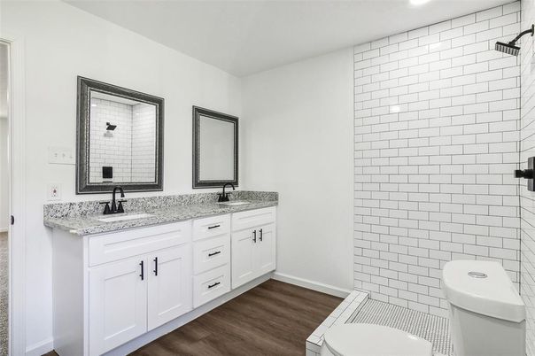 Bathroom, Dual Sink Vanities, Interior, Recessed Lighting, Wood Texture Flooring