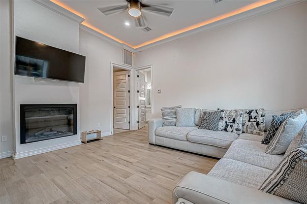 Fireplace, Interior, Living room, Recessed Lighting, Wood Texture Flooring