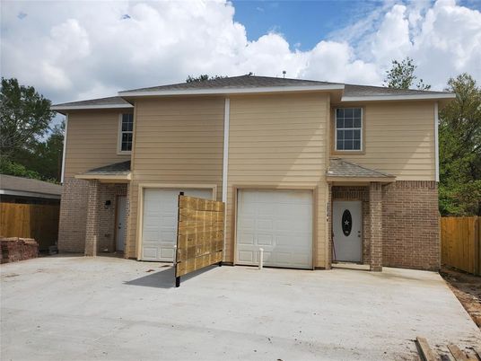 Attached, Exterior, Facade, Brick Facade, Modern