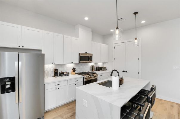 Interior, Kitchen, Pendant Lights, Recessed Lighting, Stainless Steel Appliances, Wood Texture Flooring