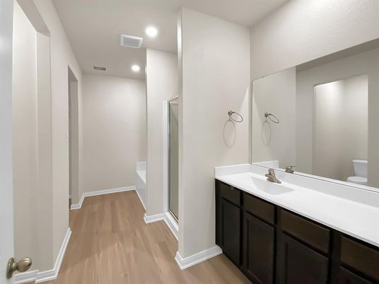 Bathroom, Dual Sink Vanities, Interior, Recessed Lighting, Wood Texture Flooring
