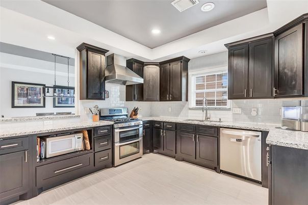Interior, Kitchen, Pendant Lights, Recessed Lighting, Stainless Steel Appliances, Wood Texture Flooring