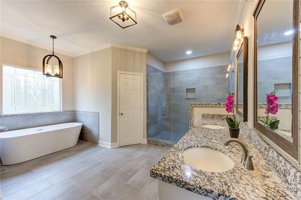 Bathroom, Dual Sink Vanities, Free Standing Baths, Glass Shower, Interior, Pendant Lights, Recessed Lighting, Wood Texture Flooring