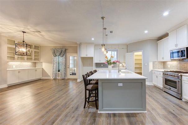 Interior, Kitchen, Pendant Lights, Recessed Lighting, Stainless Steel Appliances, Wood Texture Flooring