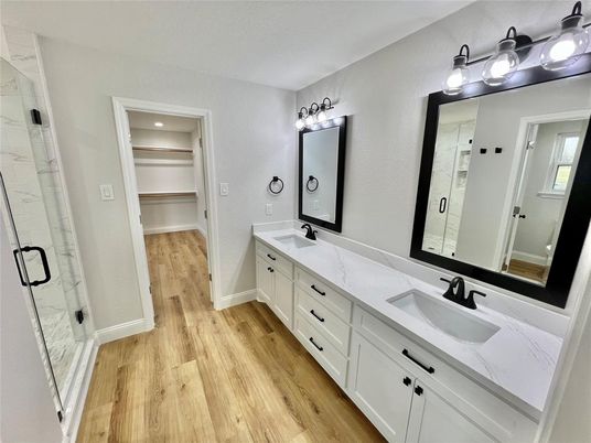 Bathroom, Dual Sink Vanities, Interior, Walk-in Closets, Wood Texture Flooring