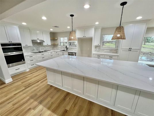 Interior, Kitchen, Pendant Lights, Recessed Lighting, Stainless Steel Appliances, Wood Texture Flooring