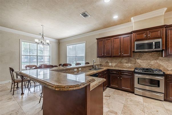 Chandelier, Dining room, Interior, Kitchen, Recessed Lighting, Stainless Steel Appliances