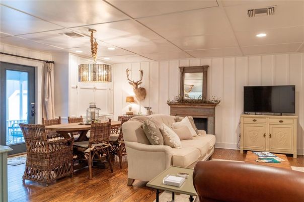 Dining room, Fireplace, Interior, Living room, Pendant Lights, Recessed Lighting, Wood Texture Flooring
