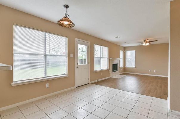 Empty room, Fireplace, Interior, Pendant Lights, Wood Texture Flooring